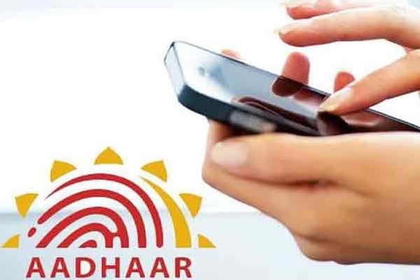 Banks and phone companies can use Aadhar for KYC